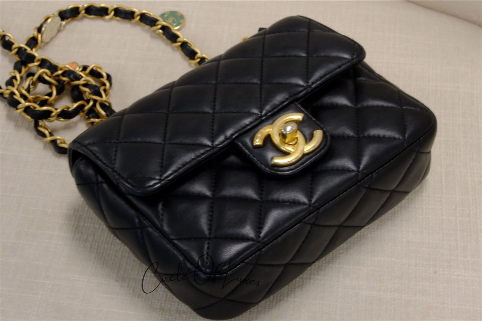 CHANEL 23C BLACK MINI SQUARE LAMSKIN CHARM COIN