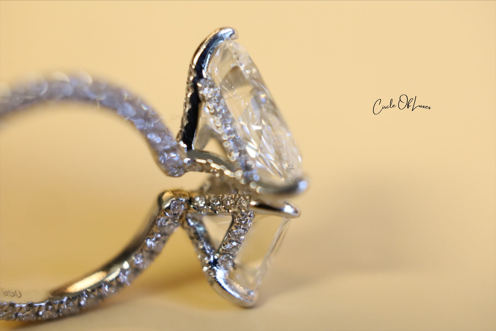 Platinum Princess Cut 2.5ct & pear shape 3.50ct  diamonds ring