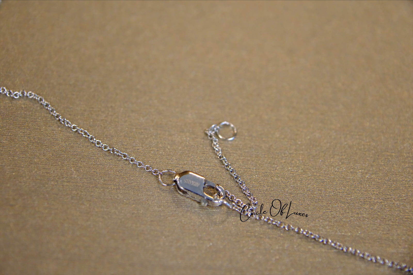 18ct White Gold Diamond and Sapphire pendant.