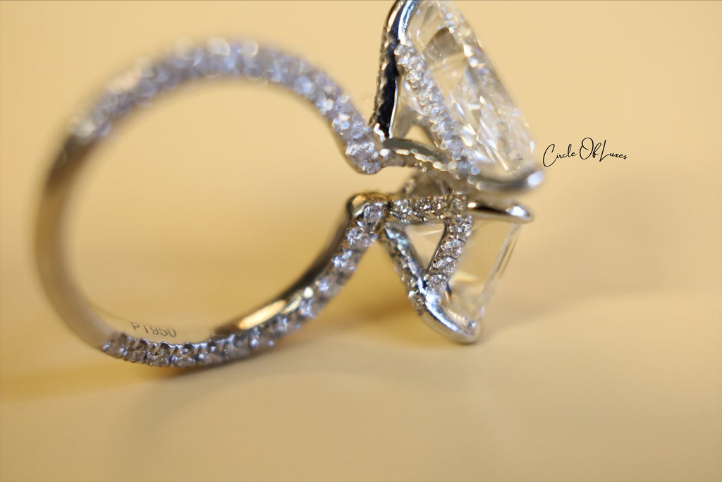 Platinum Princess Cut 2.5ct & pear shape 3.50ct  diamonds ring
