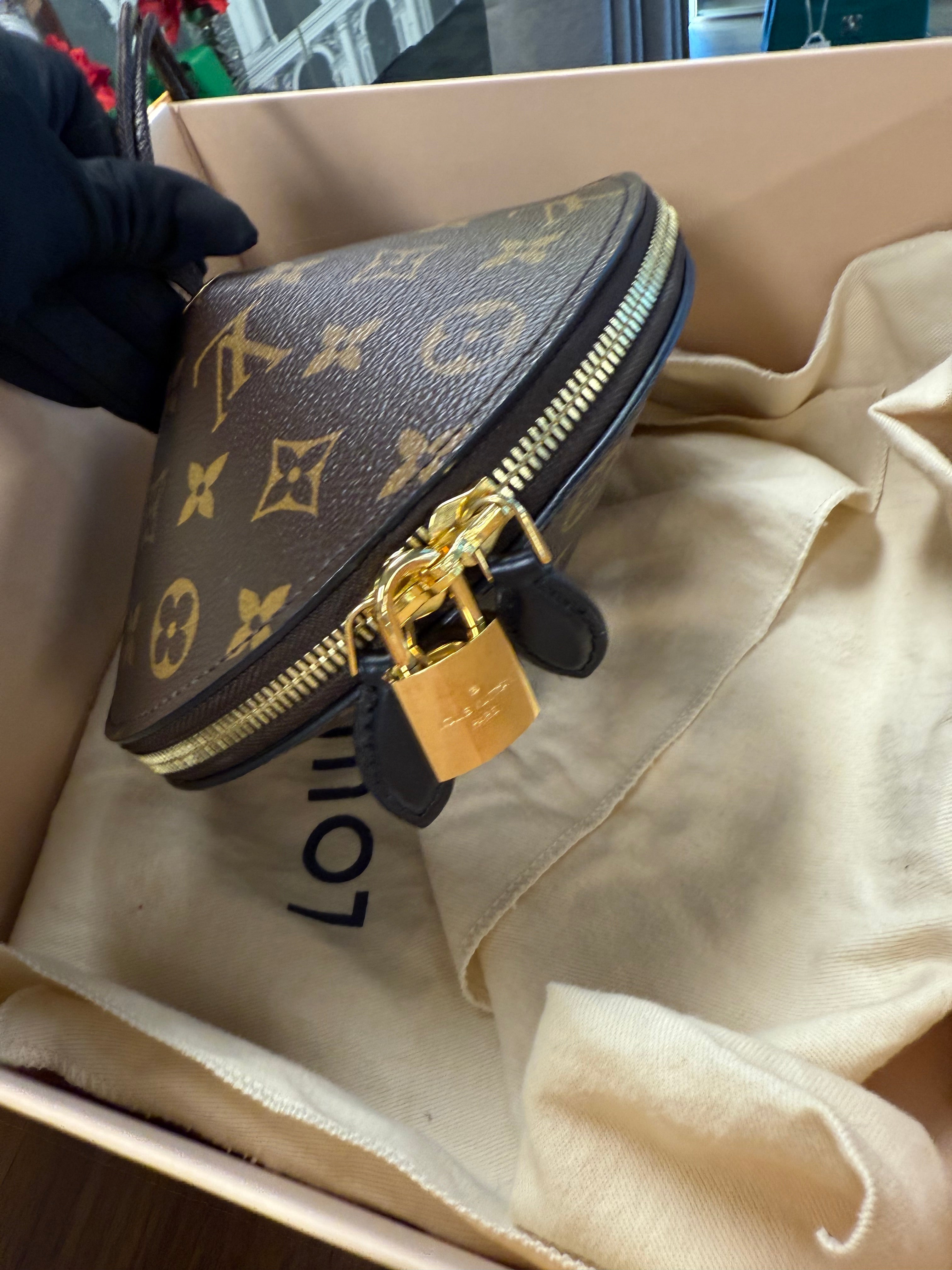 LOUIS VUITTON TOUPIE MONOGRAM CLUTCH BAG