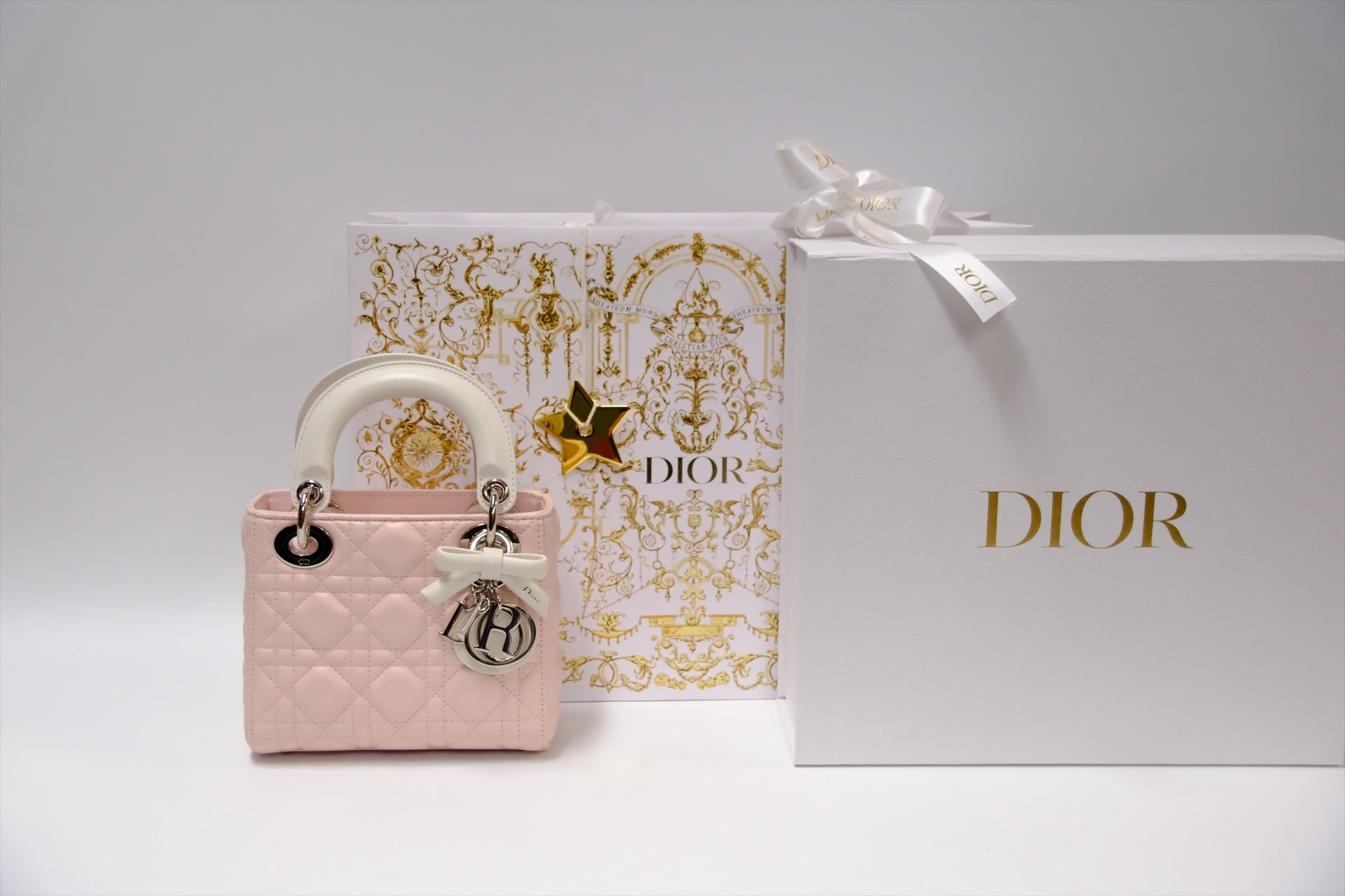 LADY DIOR MINI TWO TONE SOUPIR PINK AND LATTE LAMSKIN CANNAGE Lambskin,