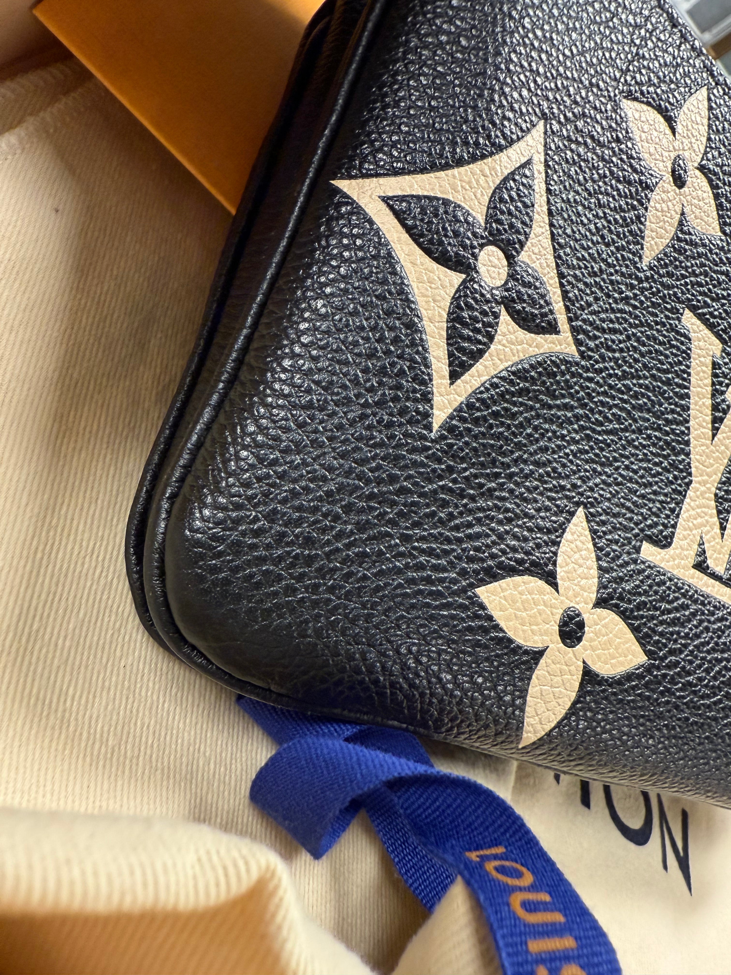 LOUIS VUITTON DOUBLE ZIP EMPRINENTE