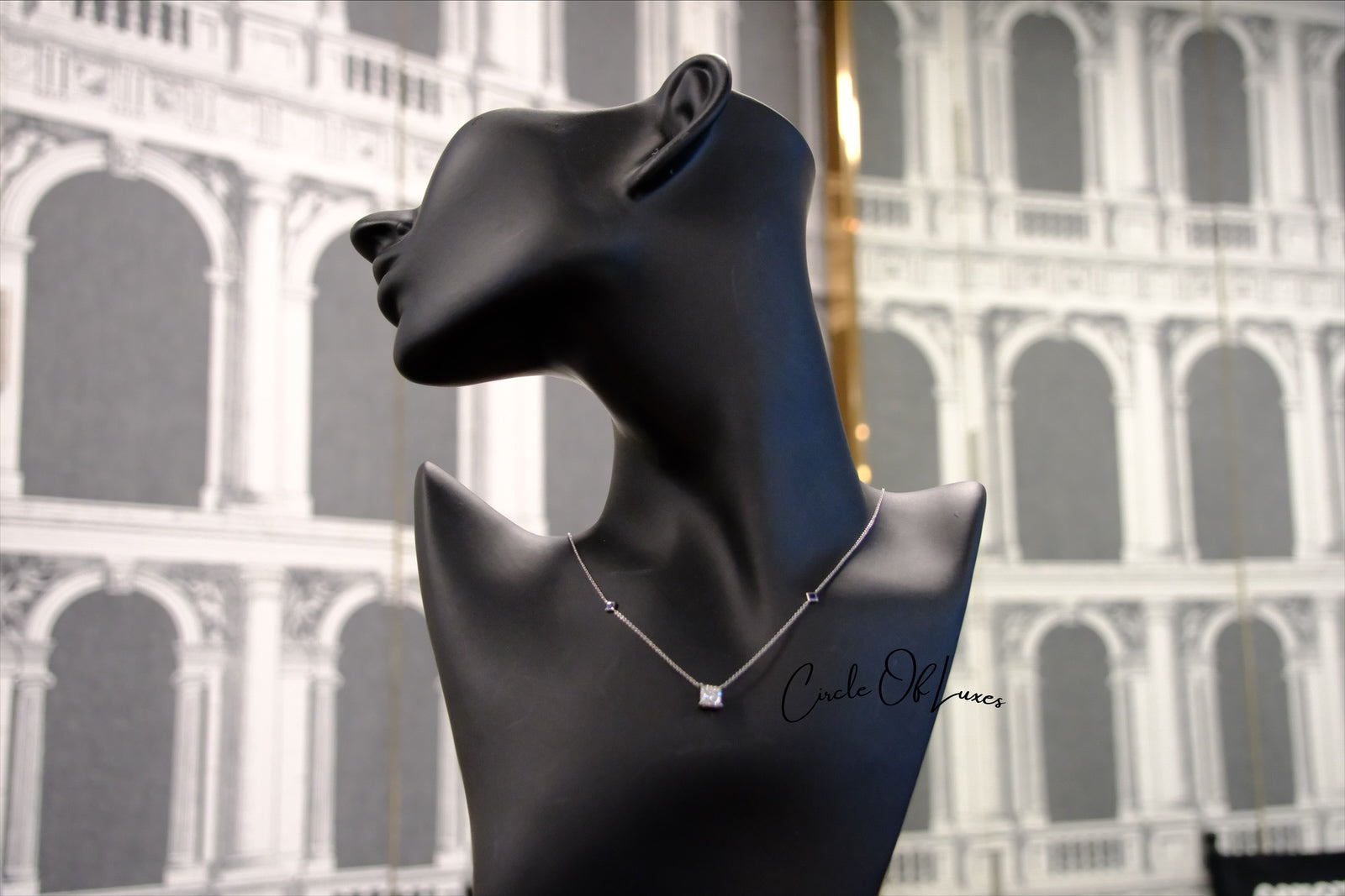 18ct White Gold Diamond and Sapphire pendant.