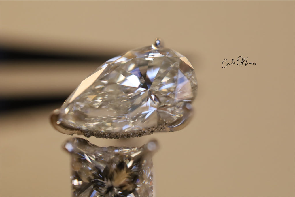 Platinum Princess Cut 2.5ct & pear shape 3.50ct  diamonds ring