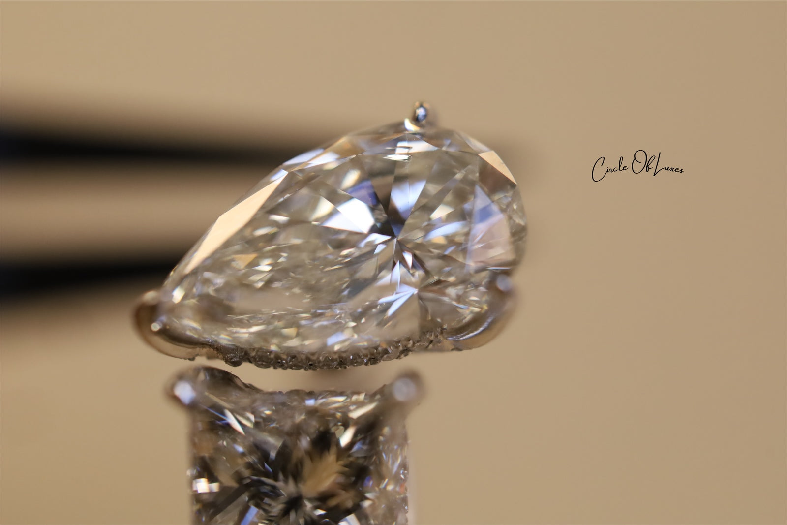 Platinum Princess Cut 2.5ct & pear shape 3.50ct  diamonds ring