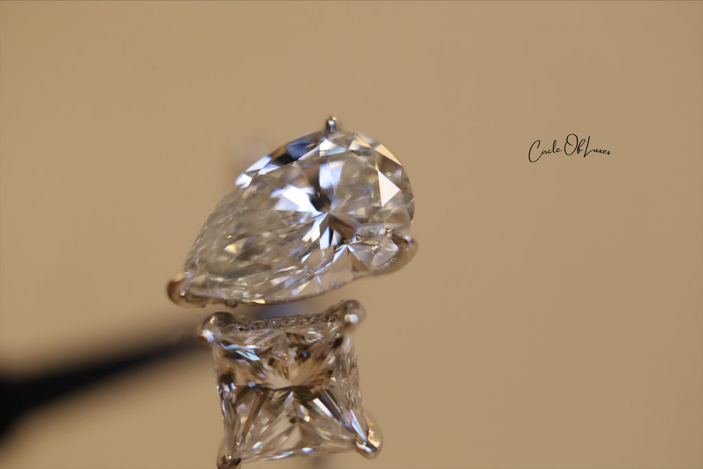 Platinum Princess Cut 2.5ct & pear shape 3.50ct  diamonds ring
