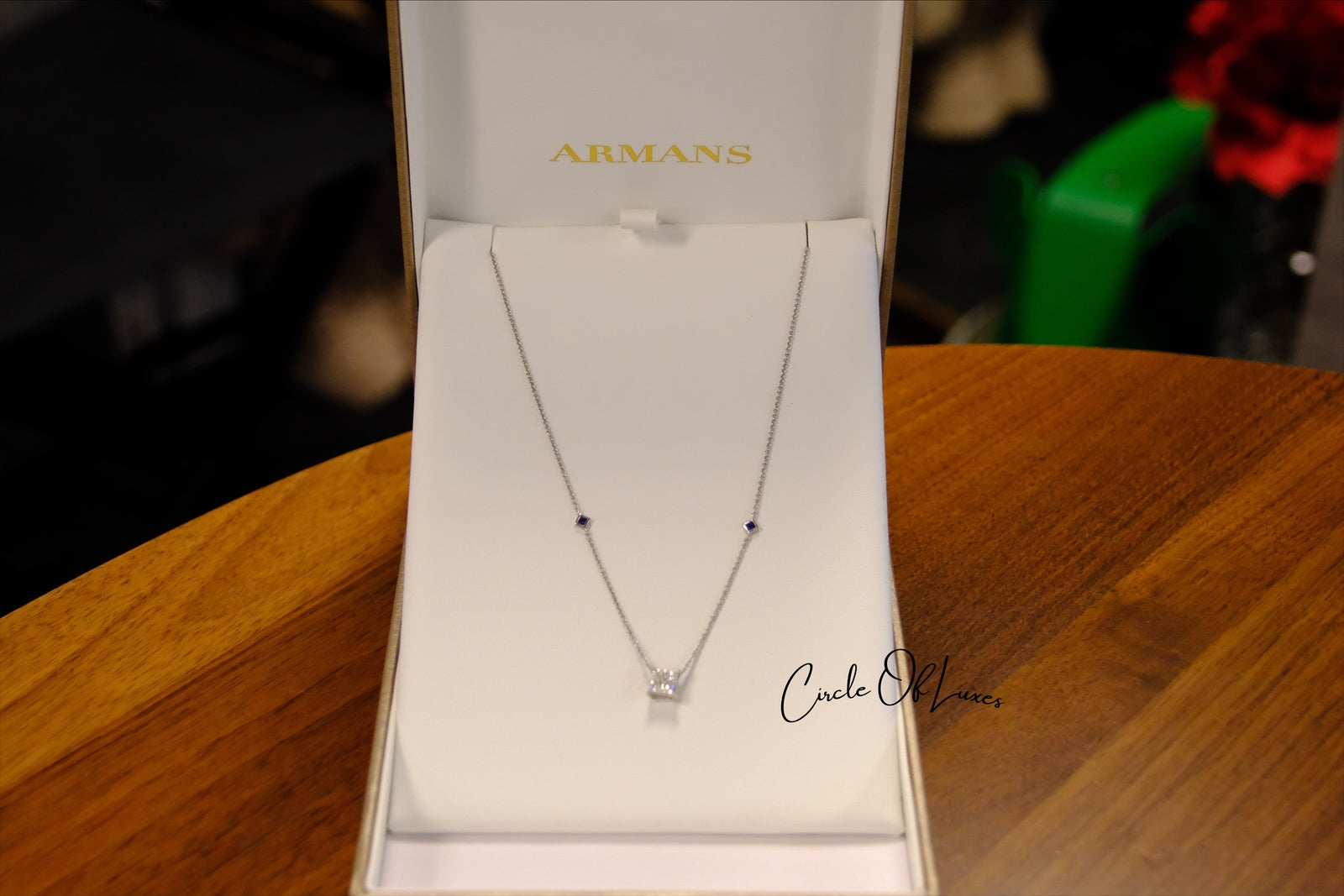 18ct White Gold Diamond and Sapphire pendant.