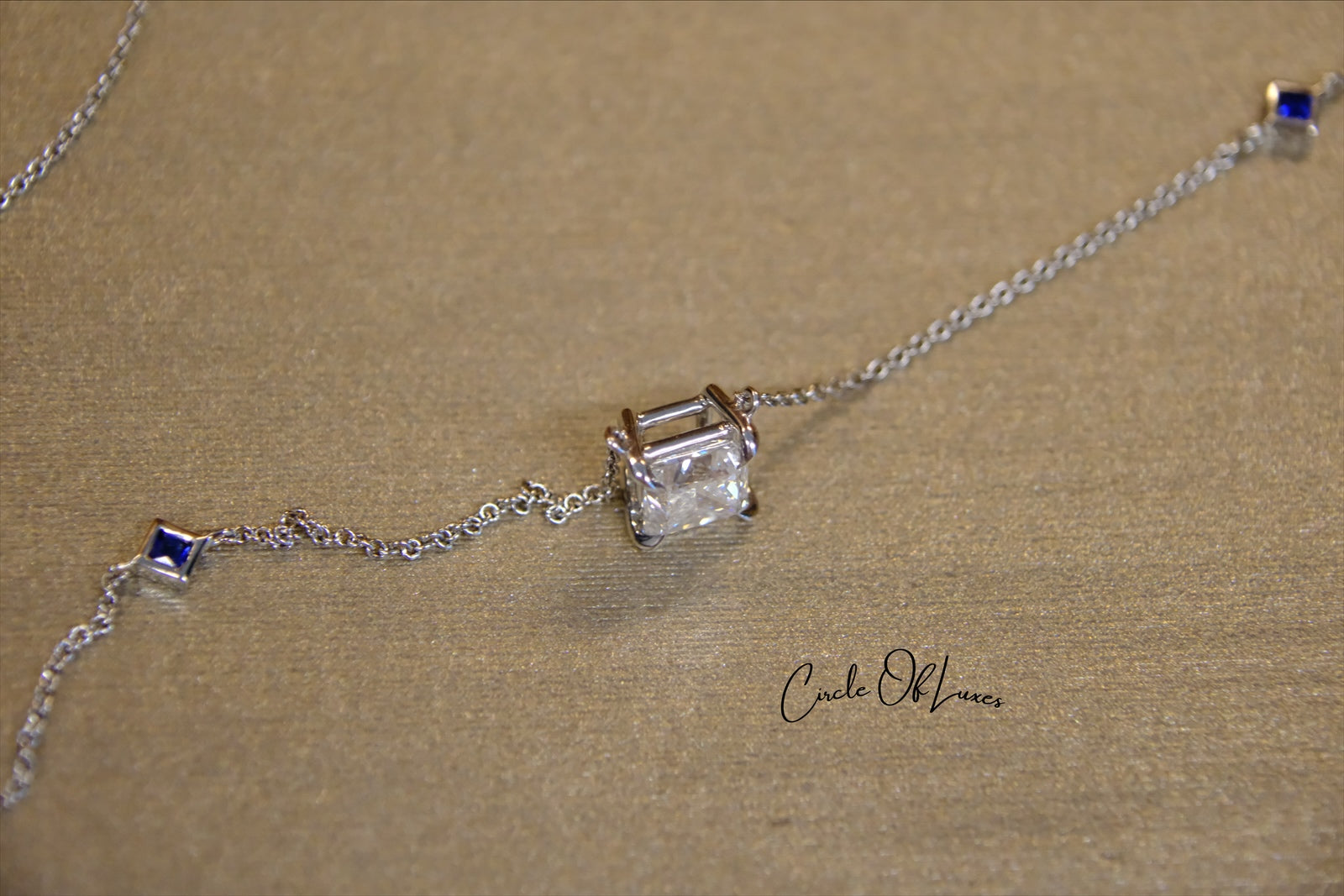 18ct White Gold Diamond and Sapphire pendant.