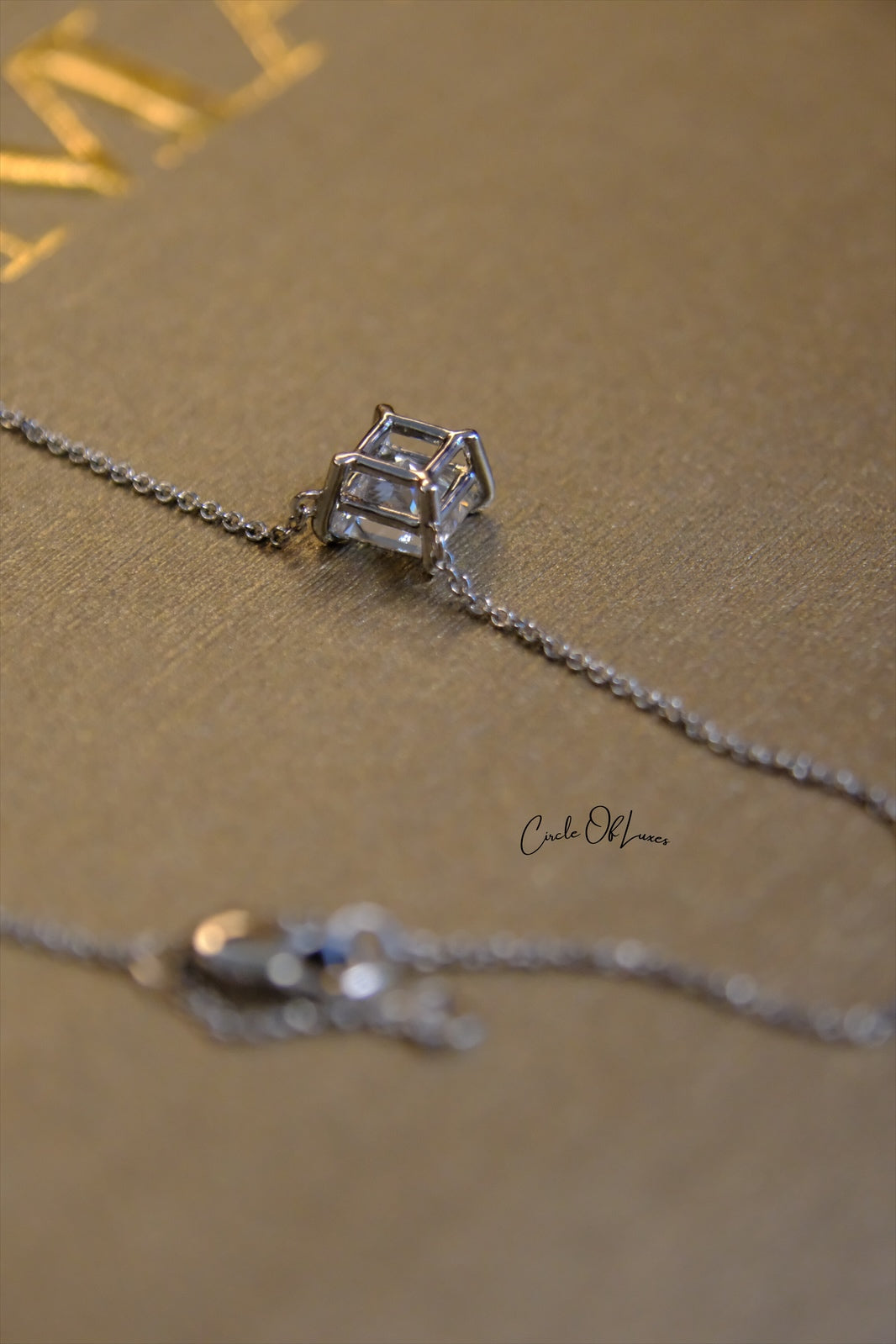 18ct White Gold Diamond and Sapphire pendant.