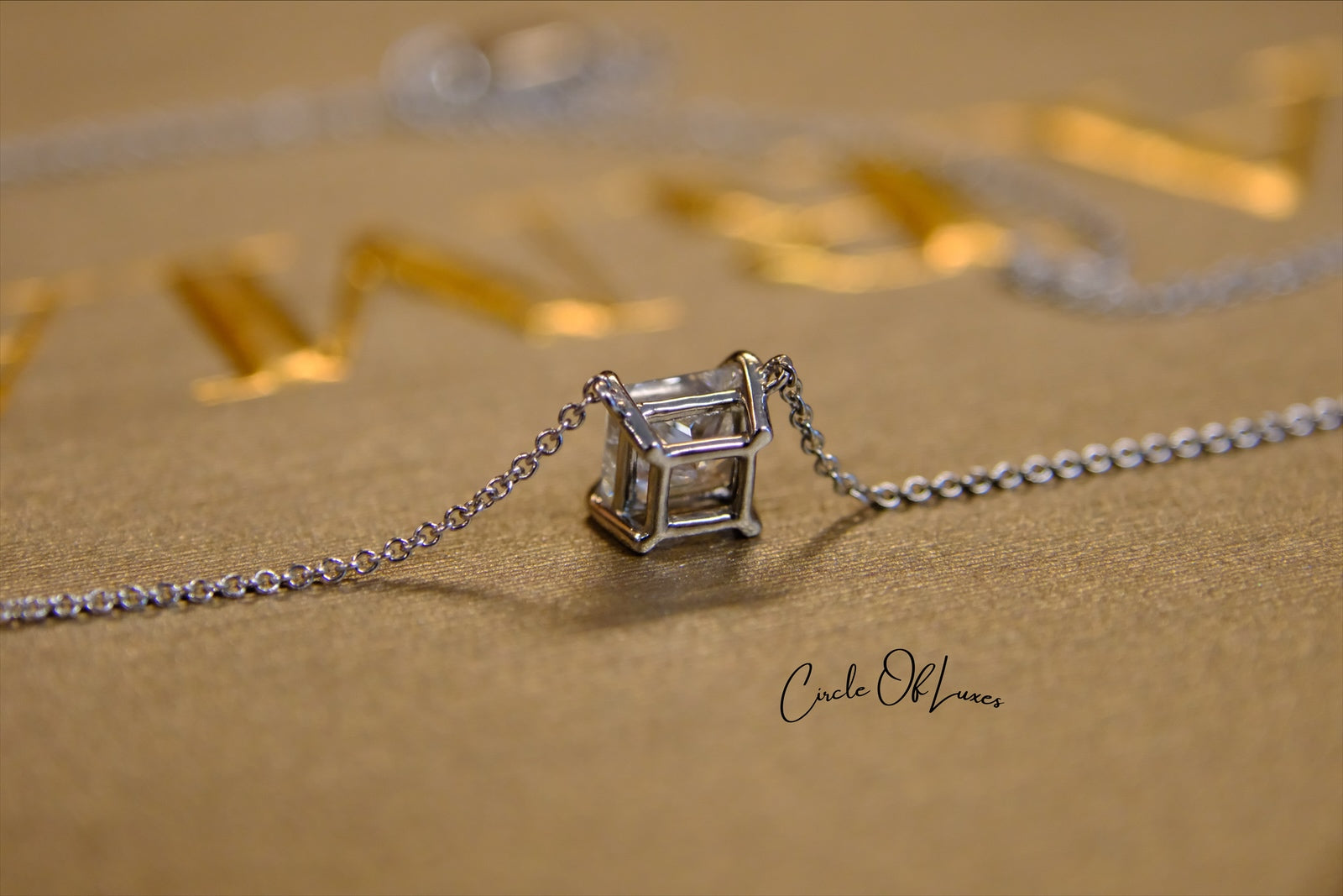 18ct White Gold Diamond and Sapphire pendant.
