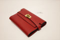 HERMES KELLY COMPACT WALLET GRENAT GHW STAMPT 003 GF