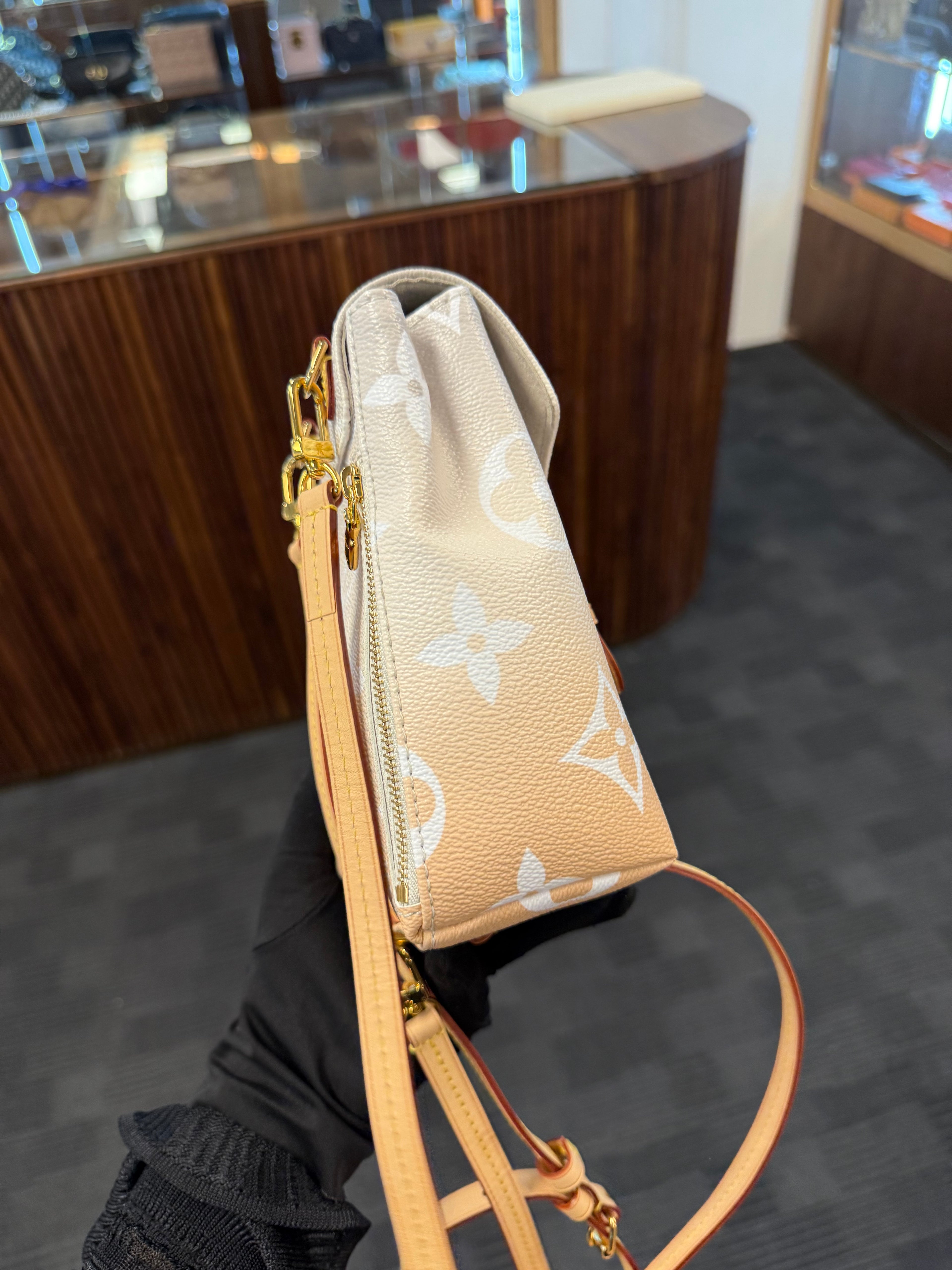 LOUIS VUITTON TINY BACKPACK MONOGRAM GIANT BY THE POOL