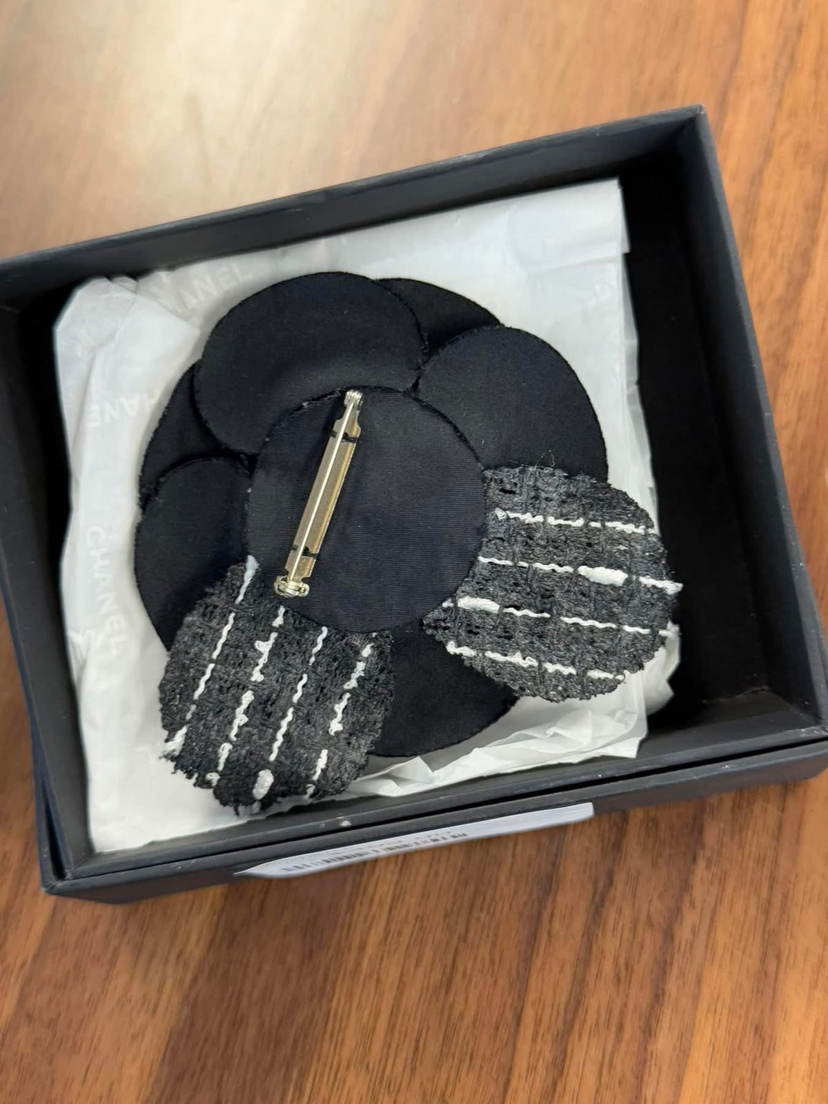 CHANEL BLACK CAMELIA BROOCH