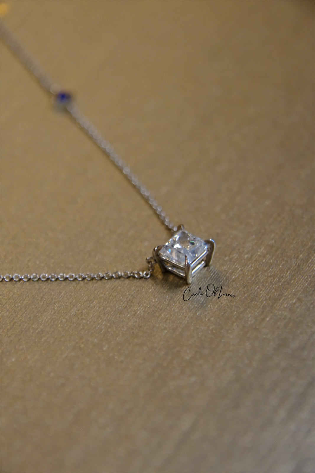 18ct White Gold Diamond and Sapphire pendant.