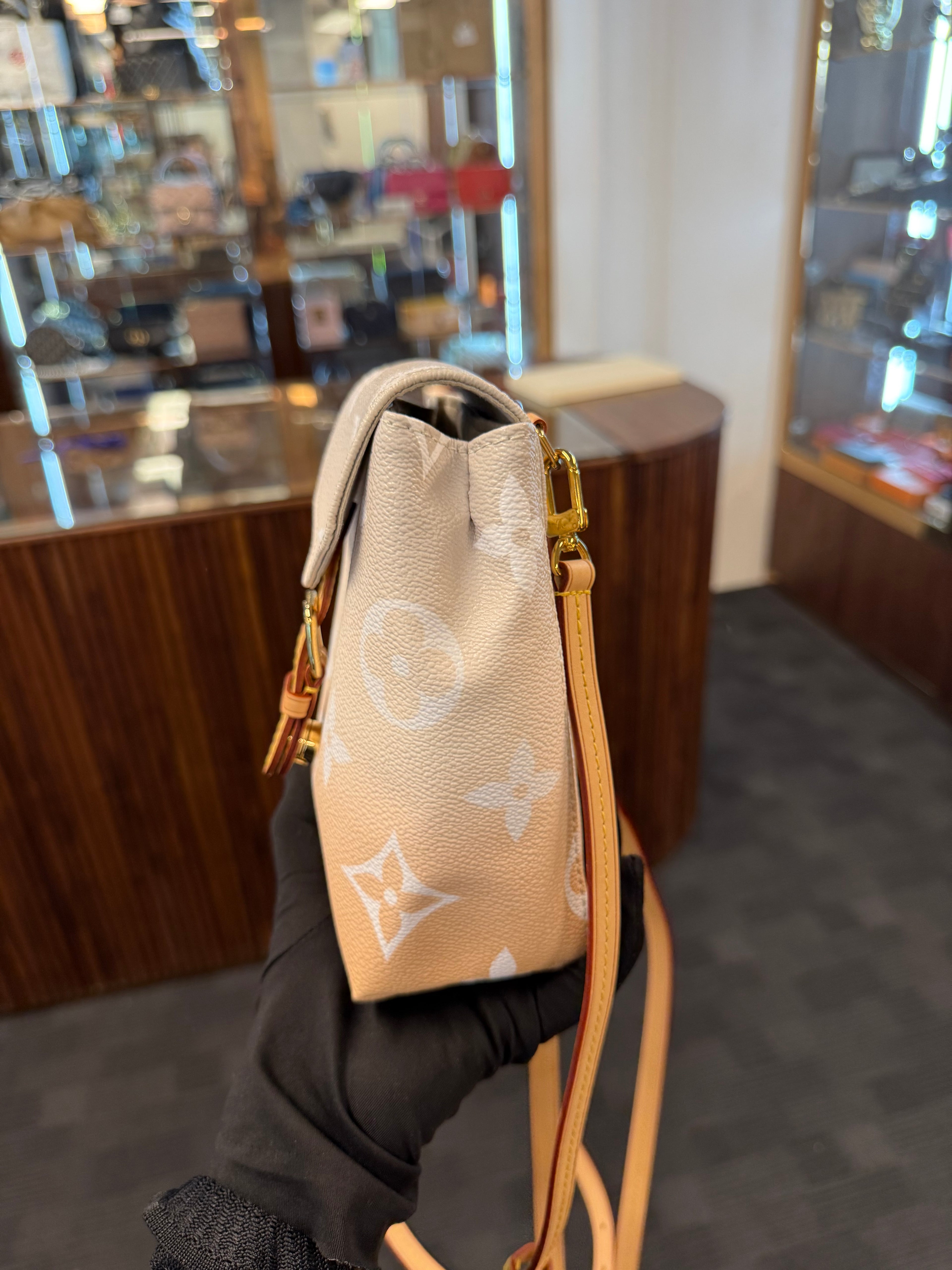 LOUIS VUITTON TINY BACKPACK MONOGRAM GIANT BY THE POOL