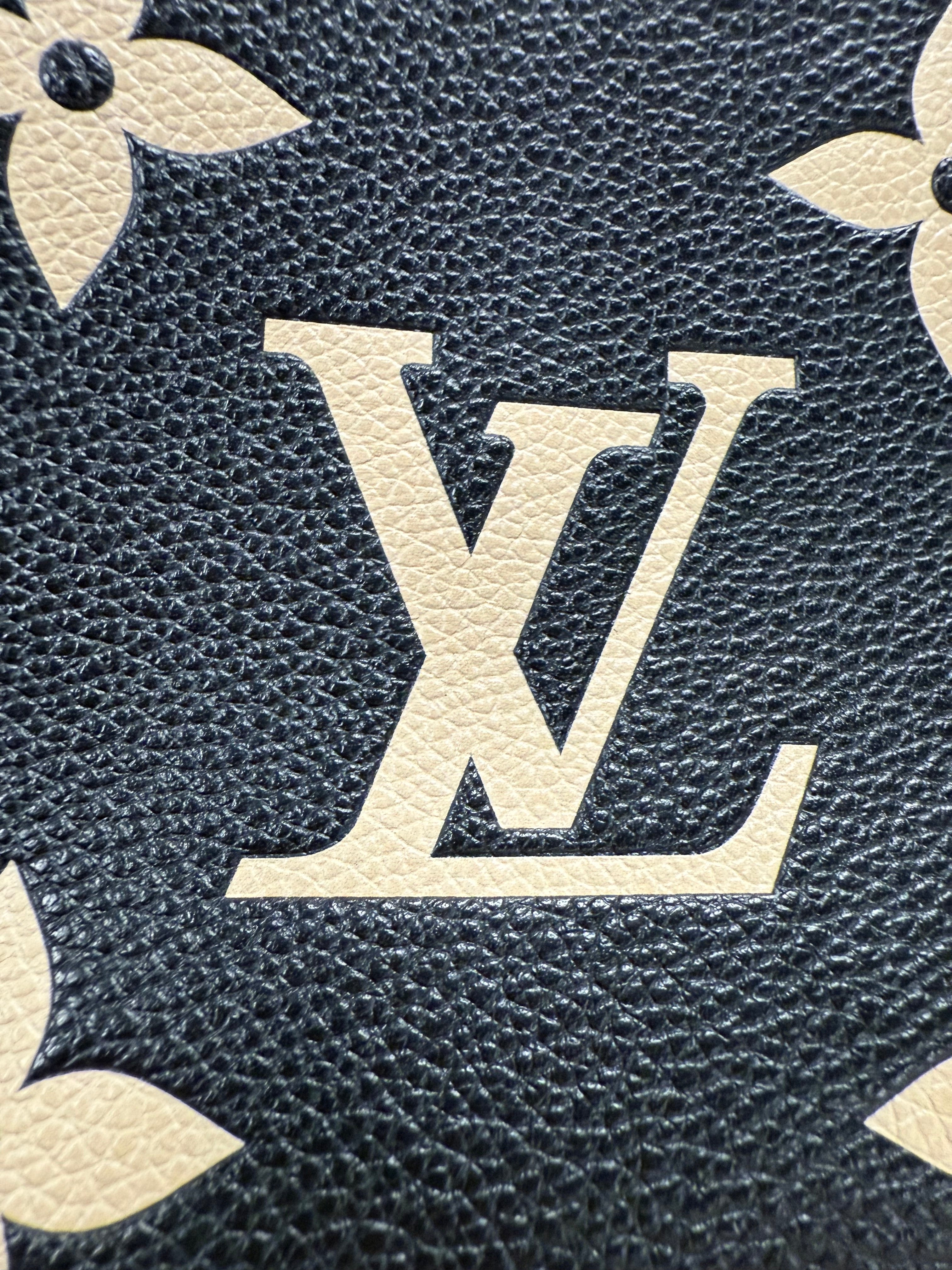 LOUIS VUITTON DOUBLE ZIP EMPRINENTE
