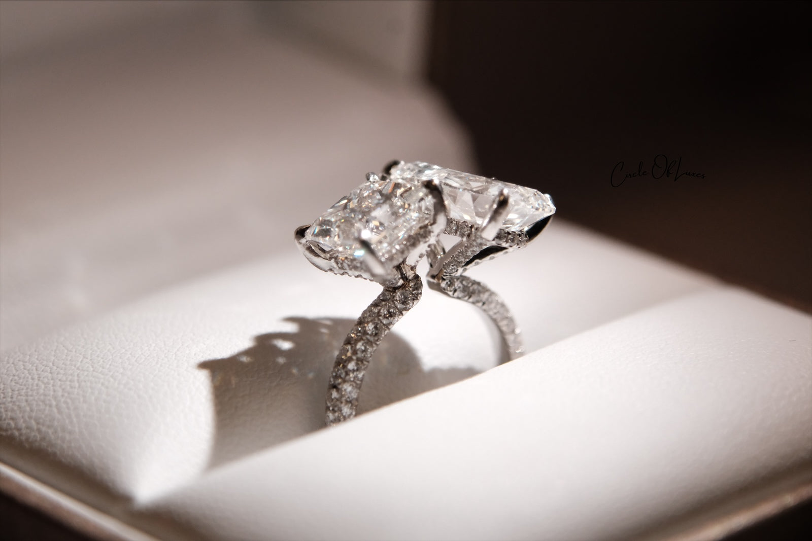 Platinum Princess Cut 2.5ct & pear shape 3.50ct  diamonds ring