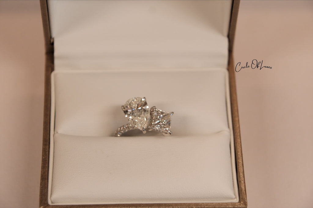 Platinum Princess Cut 2.5ct & pear shape 3.50ct  diamonds ring