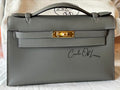 HERMES KELLY POCHETTE GRIS MYER GHW