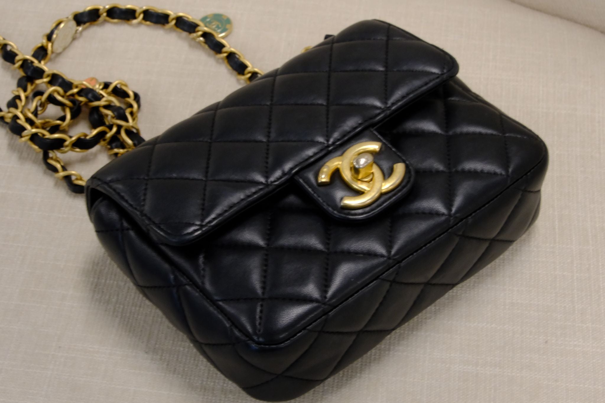 CHANEL 23C BLACK MINI SQUARE LAMSKIN CHARM COIN