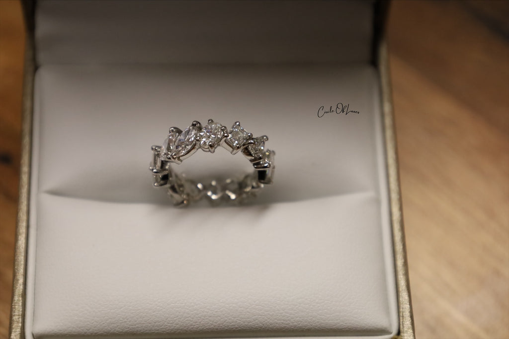 Platinum  eternity Oval, Pears, Marquise & Emerald Diamonds  ring
