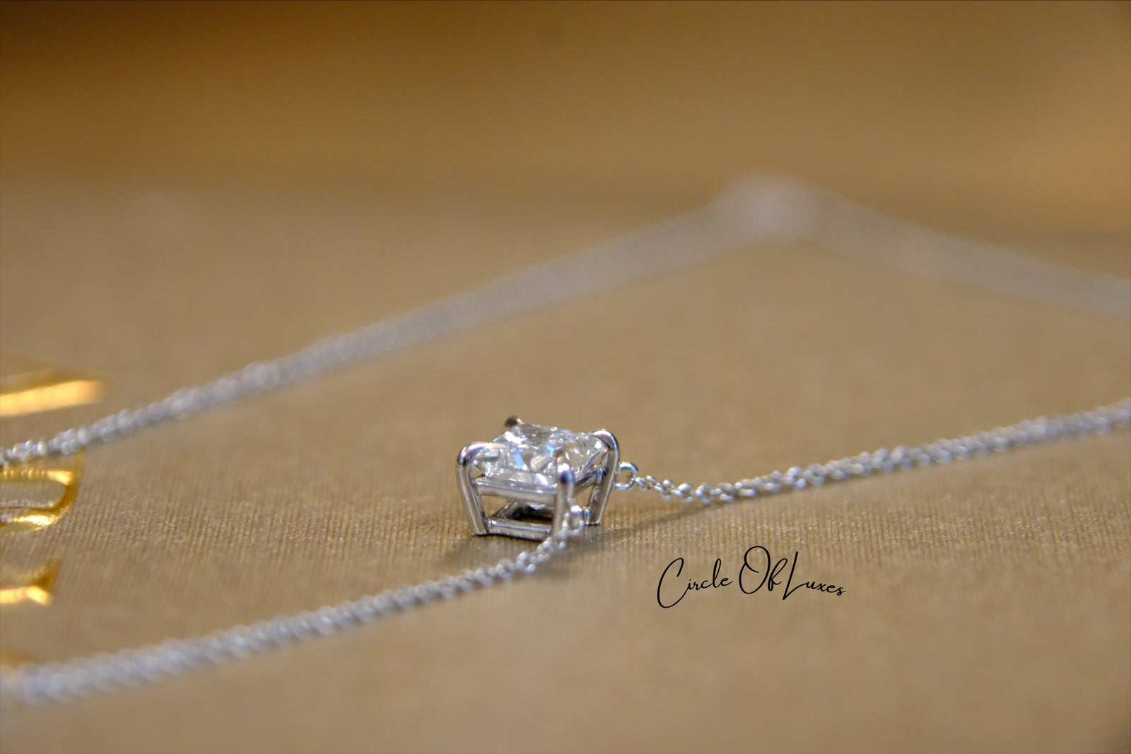 18ct White Gold Diamond and Sapphire pendant.