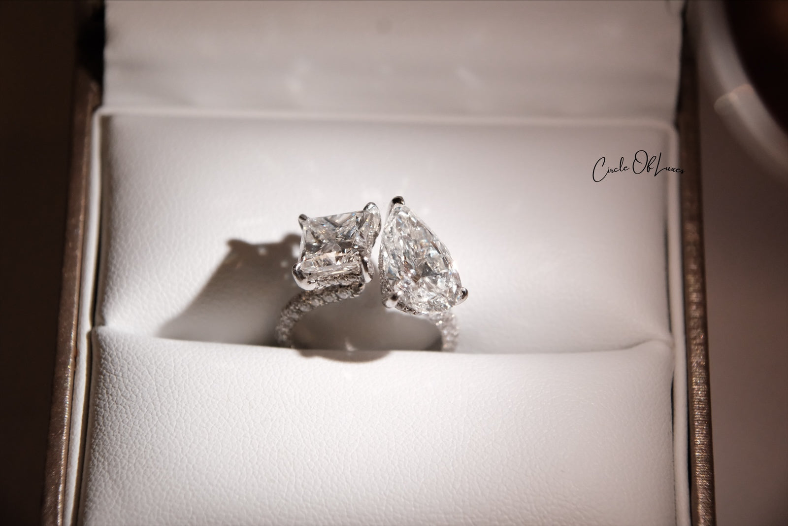 Platinum Princess Cut 2.5ct & pear shape 3.50ct  diamonds ring
