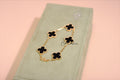 VANCLEEF 
Vintage Alhambra bracelet, 5 motifs
18K yellow gold, Onyx