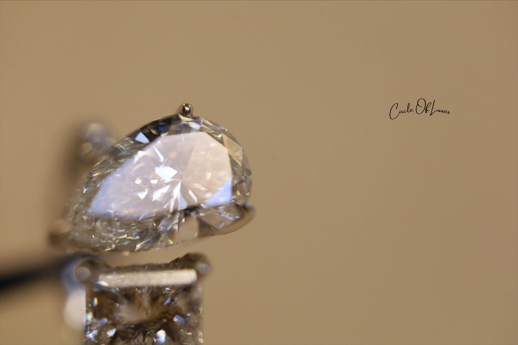 Platinum Princess Cut 2.5ct & pear shape 3.50ct  diamonds ring