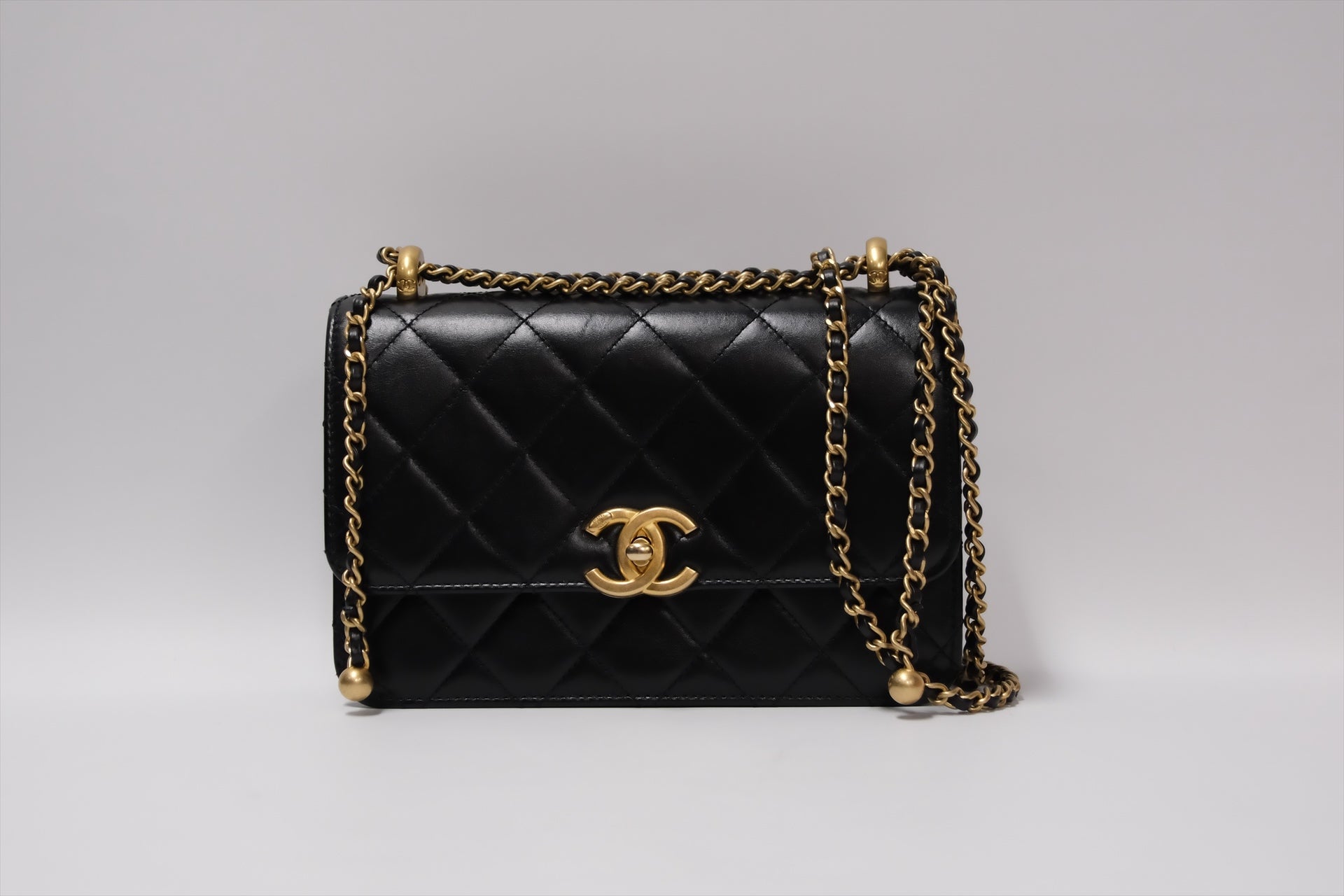 CHANEL GOLD CRUSH FLAP BAG BLACK CALFSKIN GHW