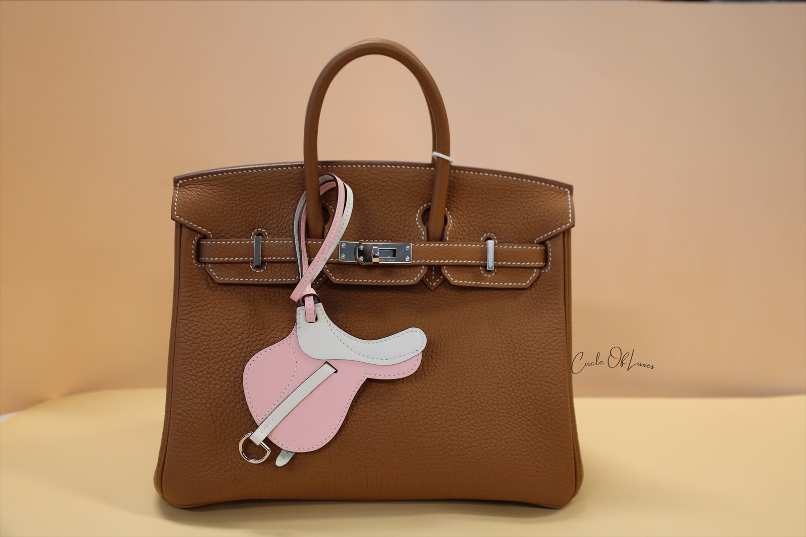 HERMES PADDLOCK FLOT HORSE SADDLE CHARM BAG
