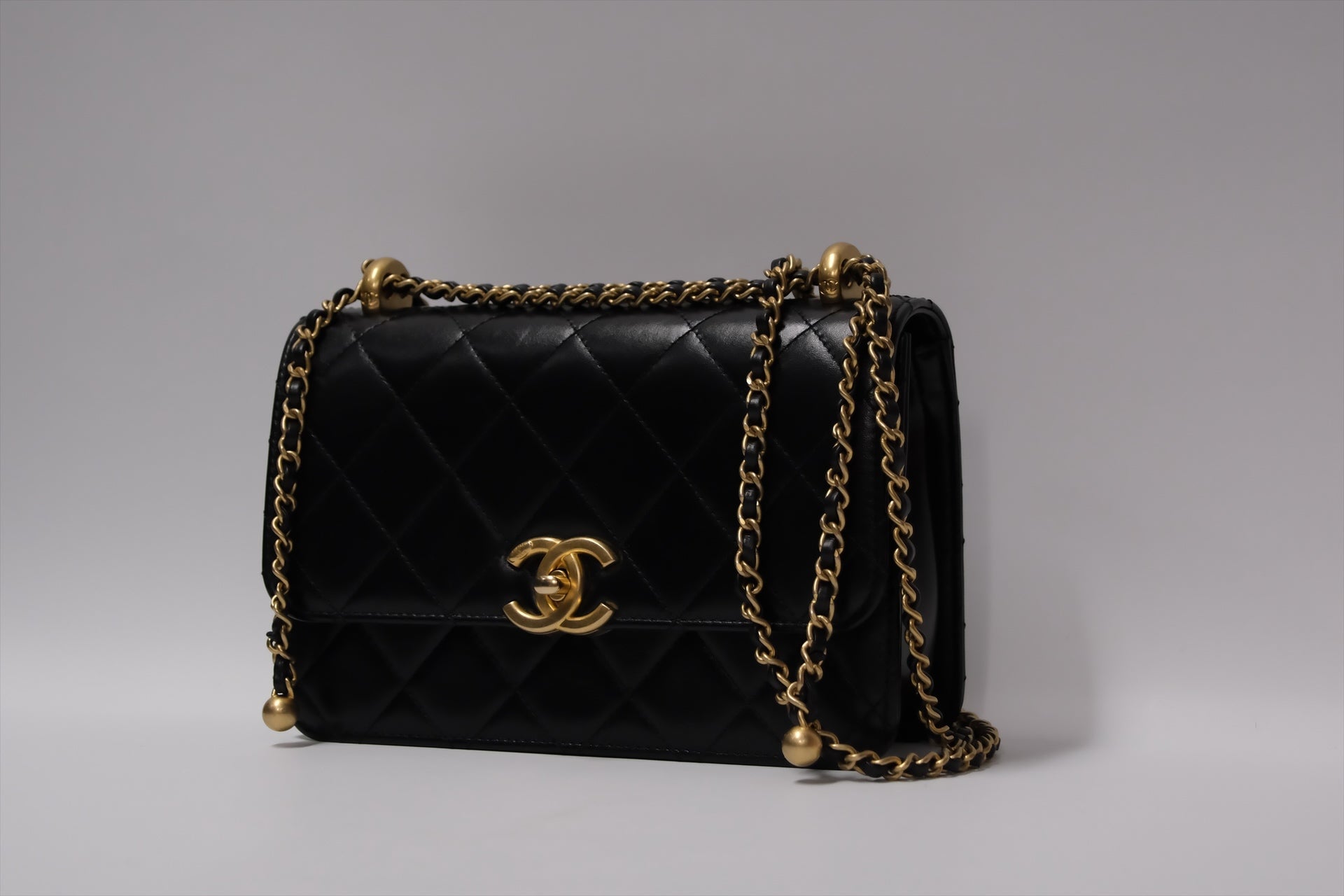 CHANEL GOLD CRUSH FLAP BAG BLACK CALFSKIN GHW