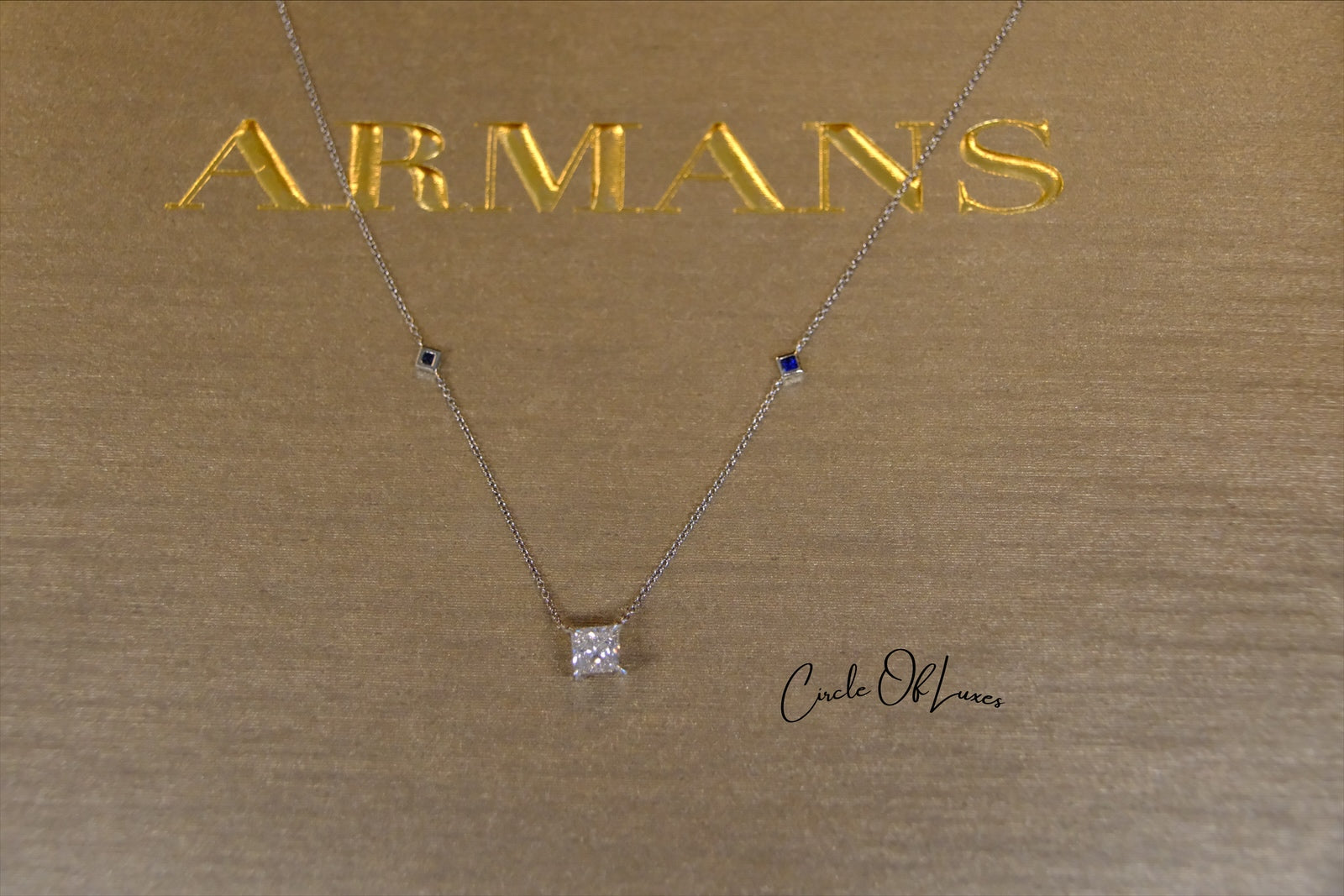 18ct White Gold Diamond and Sapphire pendant.
