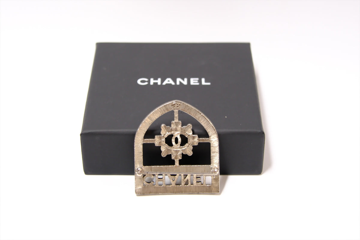 CHANEL SHIELD BROOCH WITH CRYSTALS SHW