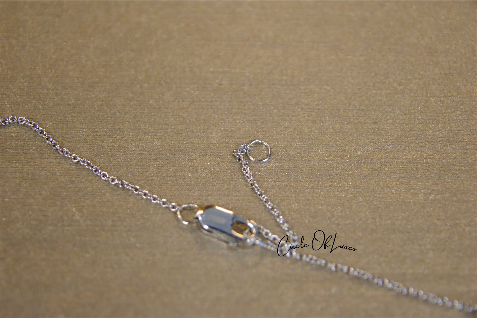 18ct White Gold Diamond and Sapphire pendant.