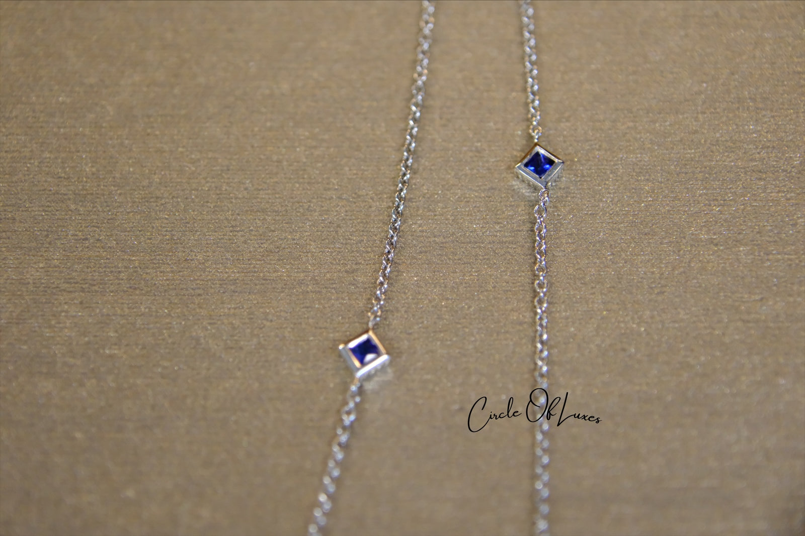 18ct White Gold Diamond and Sapphire pendant.