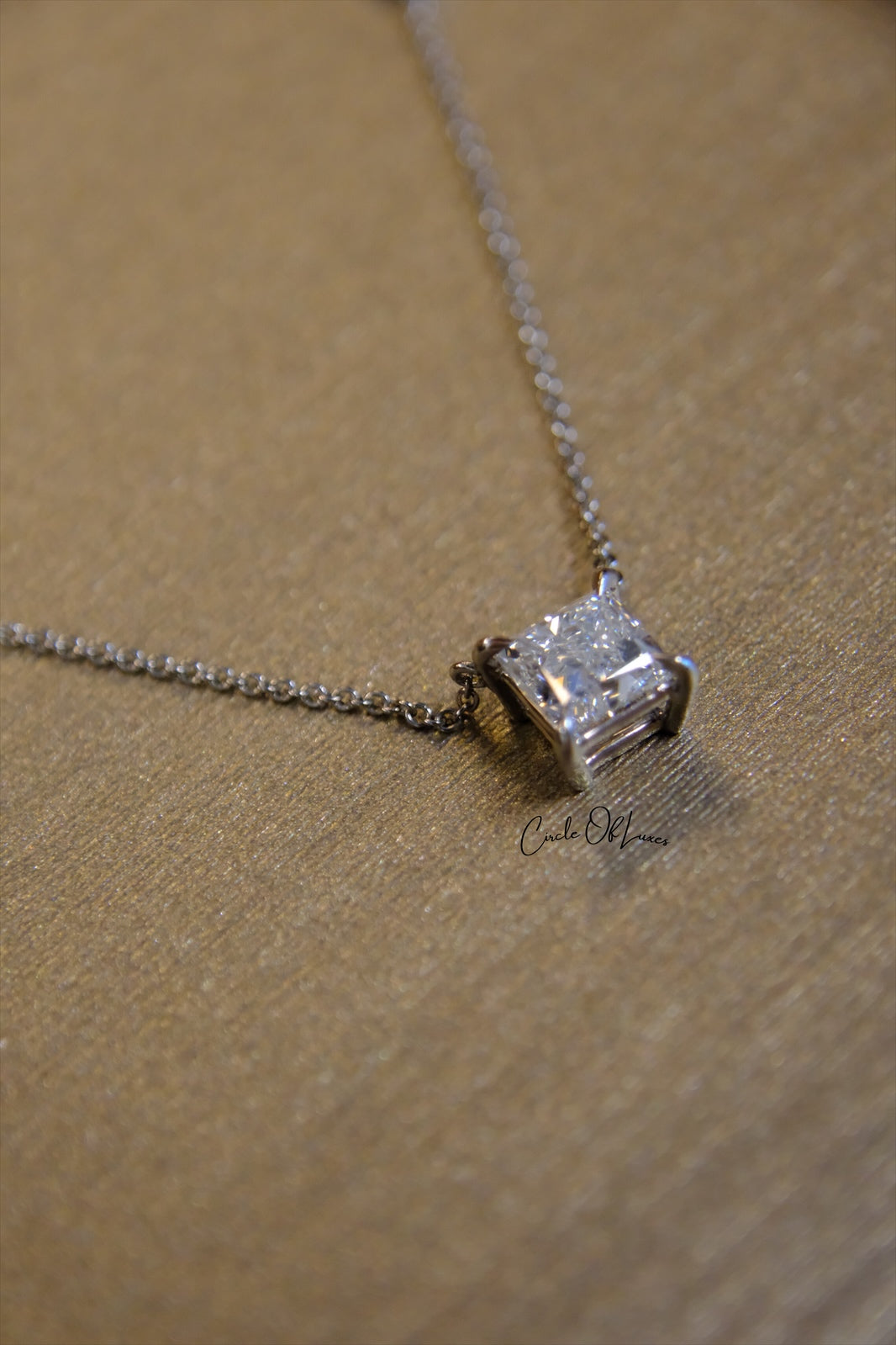 18ct White Gold Diamond and Sapphire pendant.