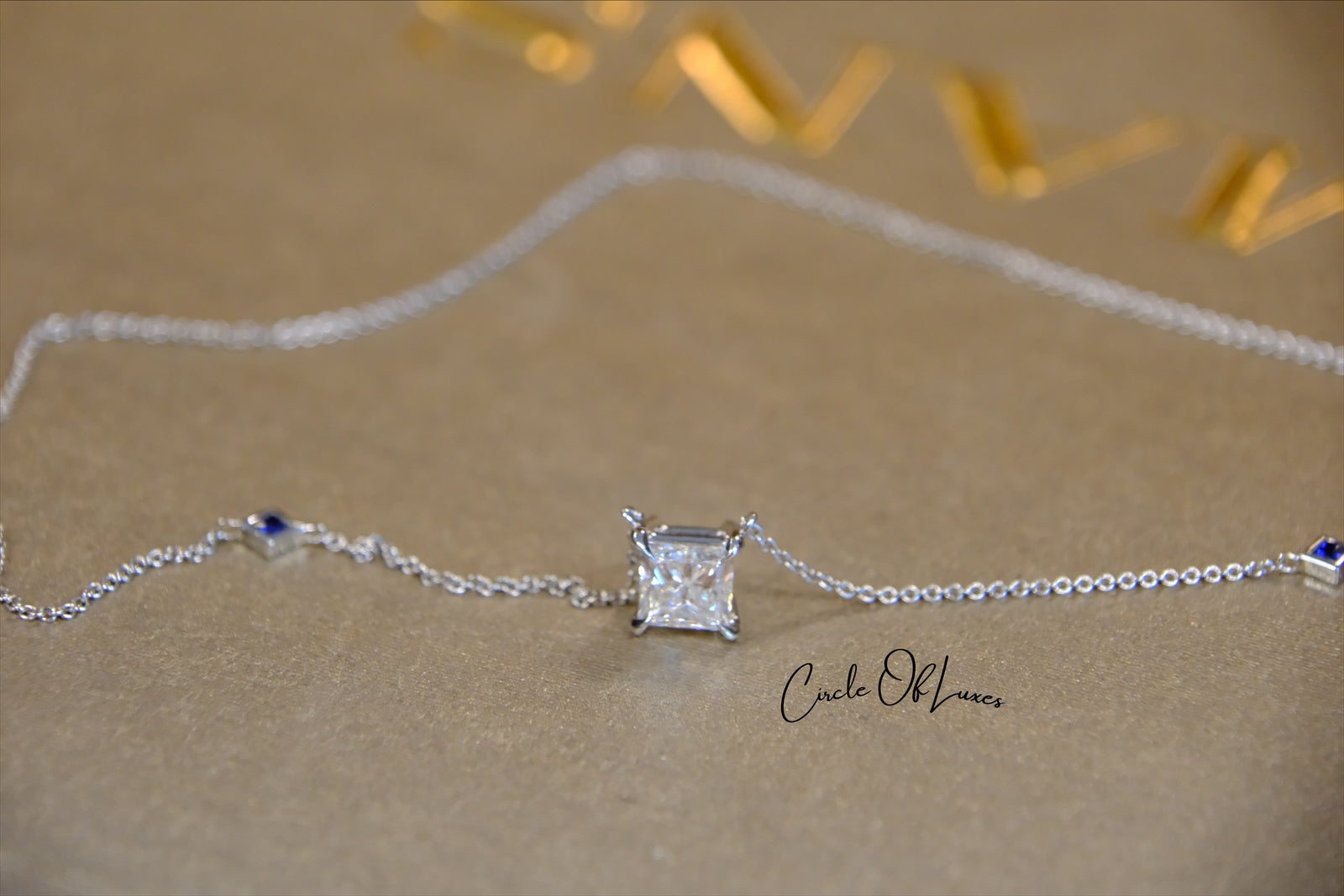 18ct White Gold Diamond and Sapphire pendant.