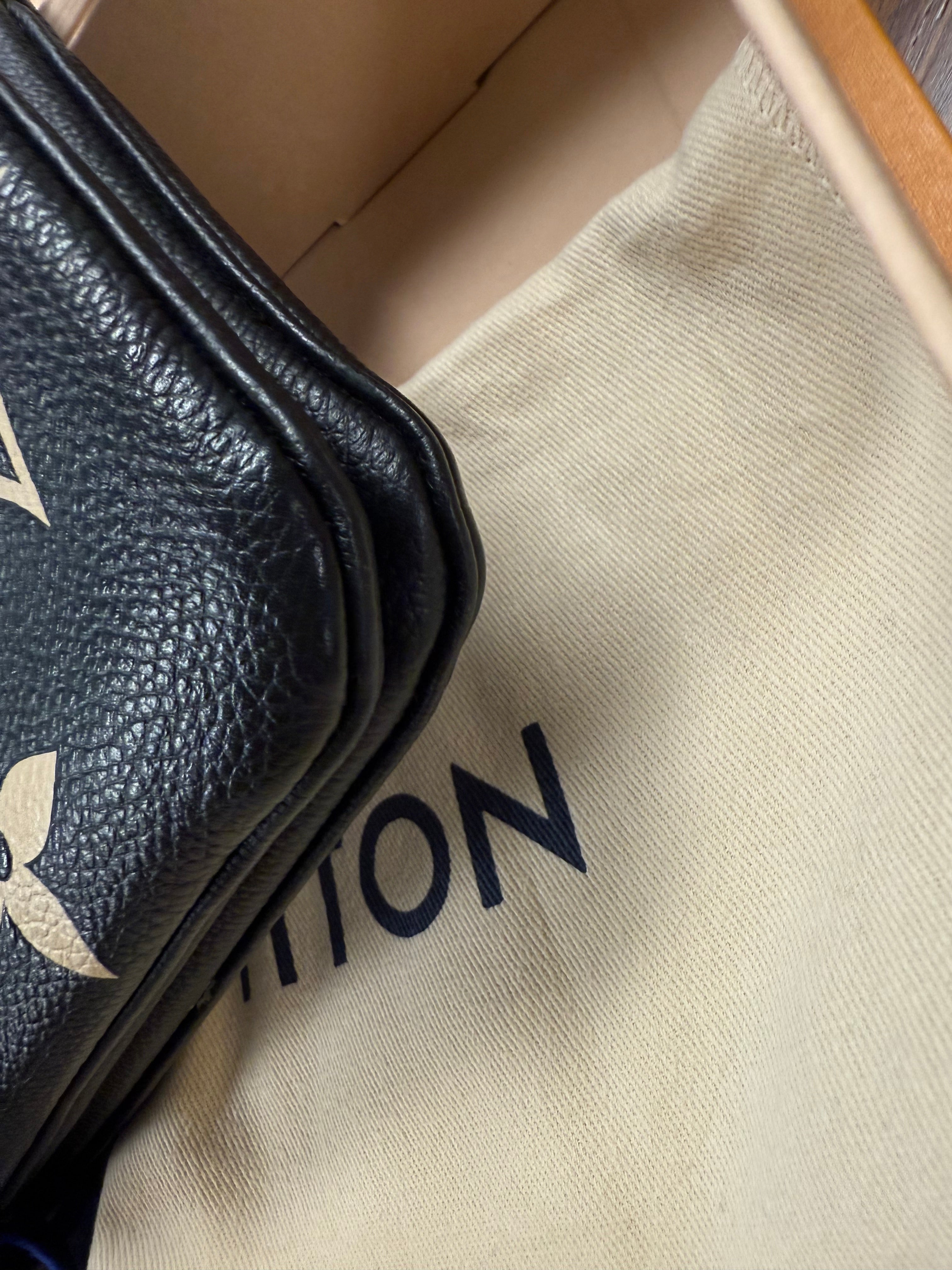 LOUIS VUITTON DOUBLE ZIP EMPRINENTE