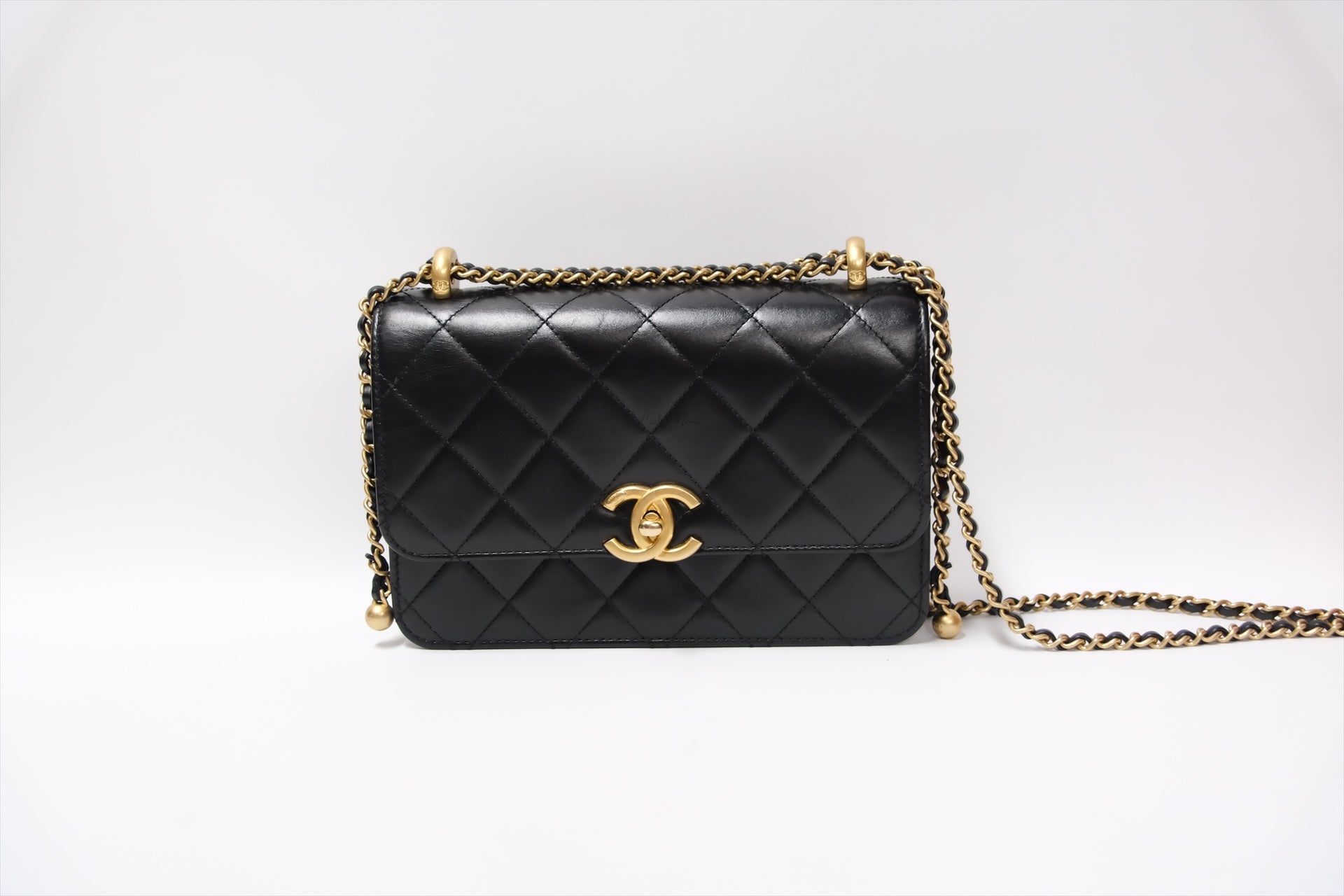 CHANEL GOLD CRUSH FLAP BAG BLACK CALFSKIN GHW