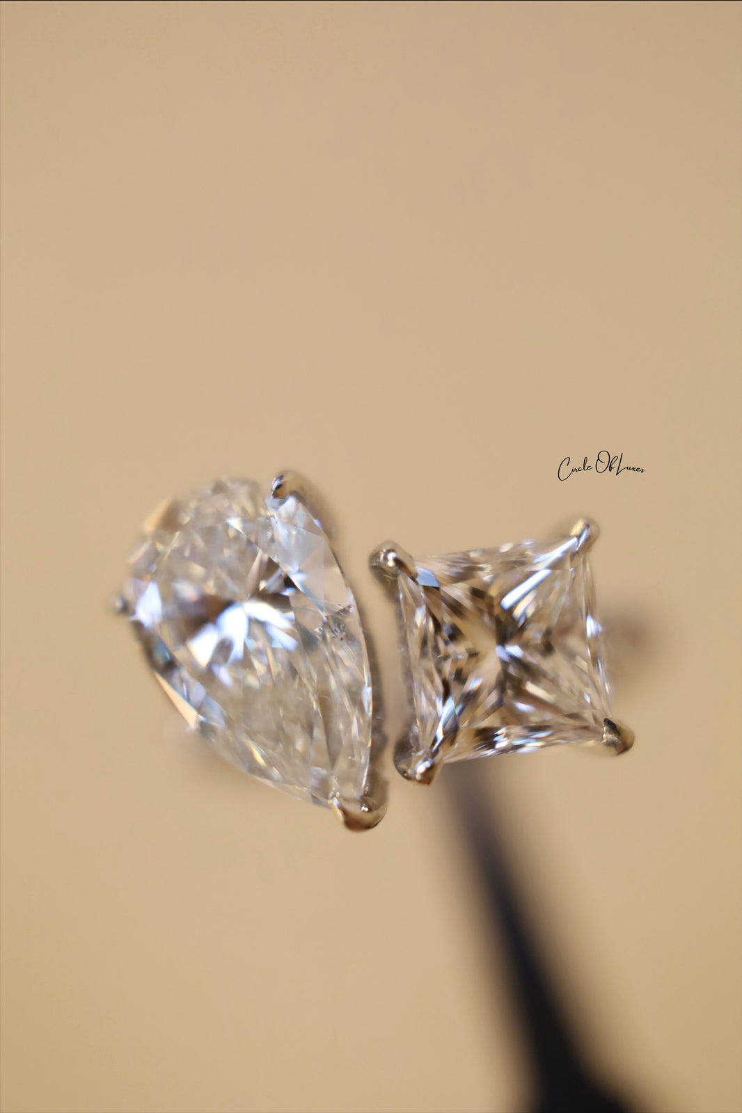 Platinum Princess Cut 2.5ct & pear shape 3.50ct  diamonds ring