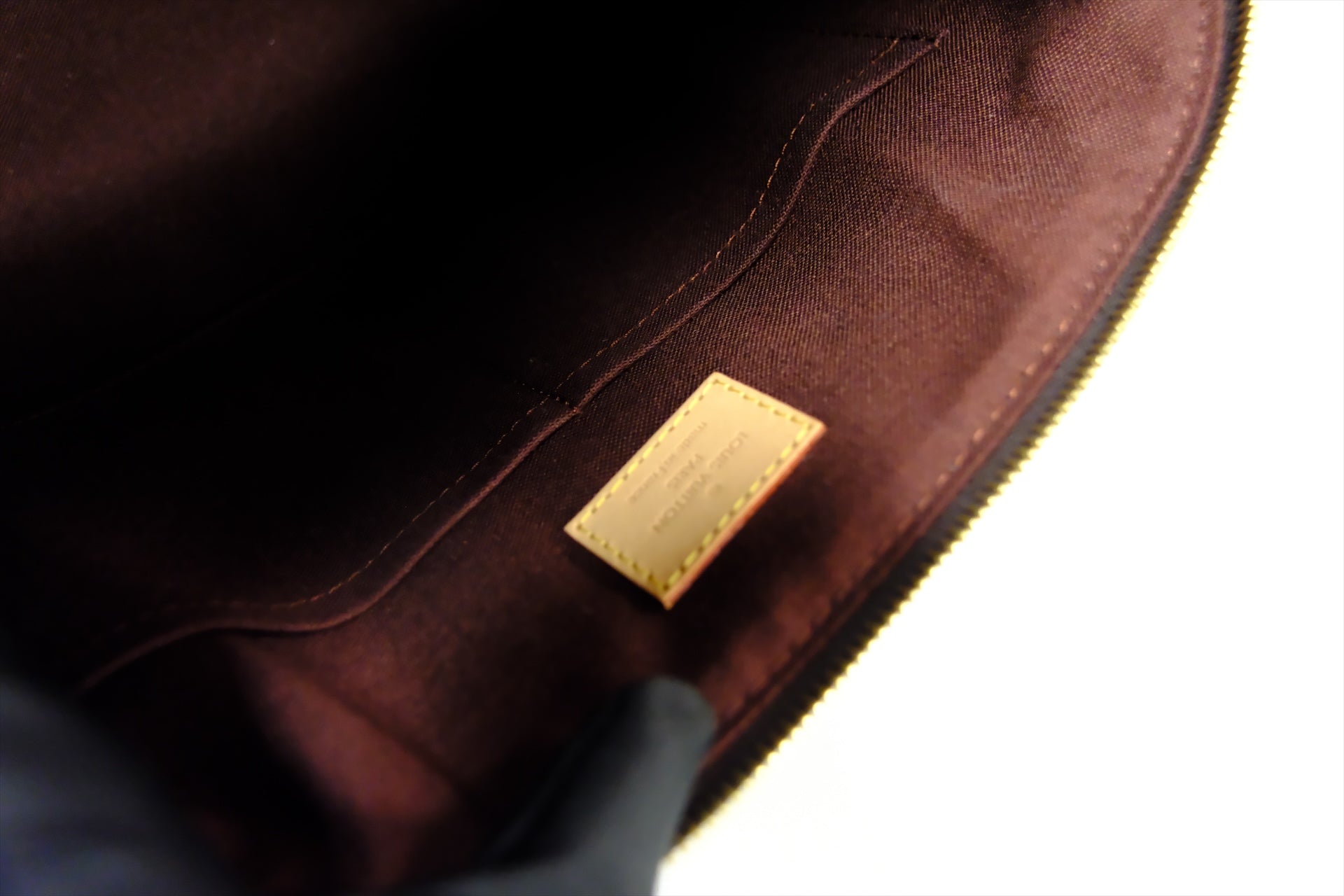 LOUIS VUITTON RIVOLI MM MOMOGRAM