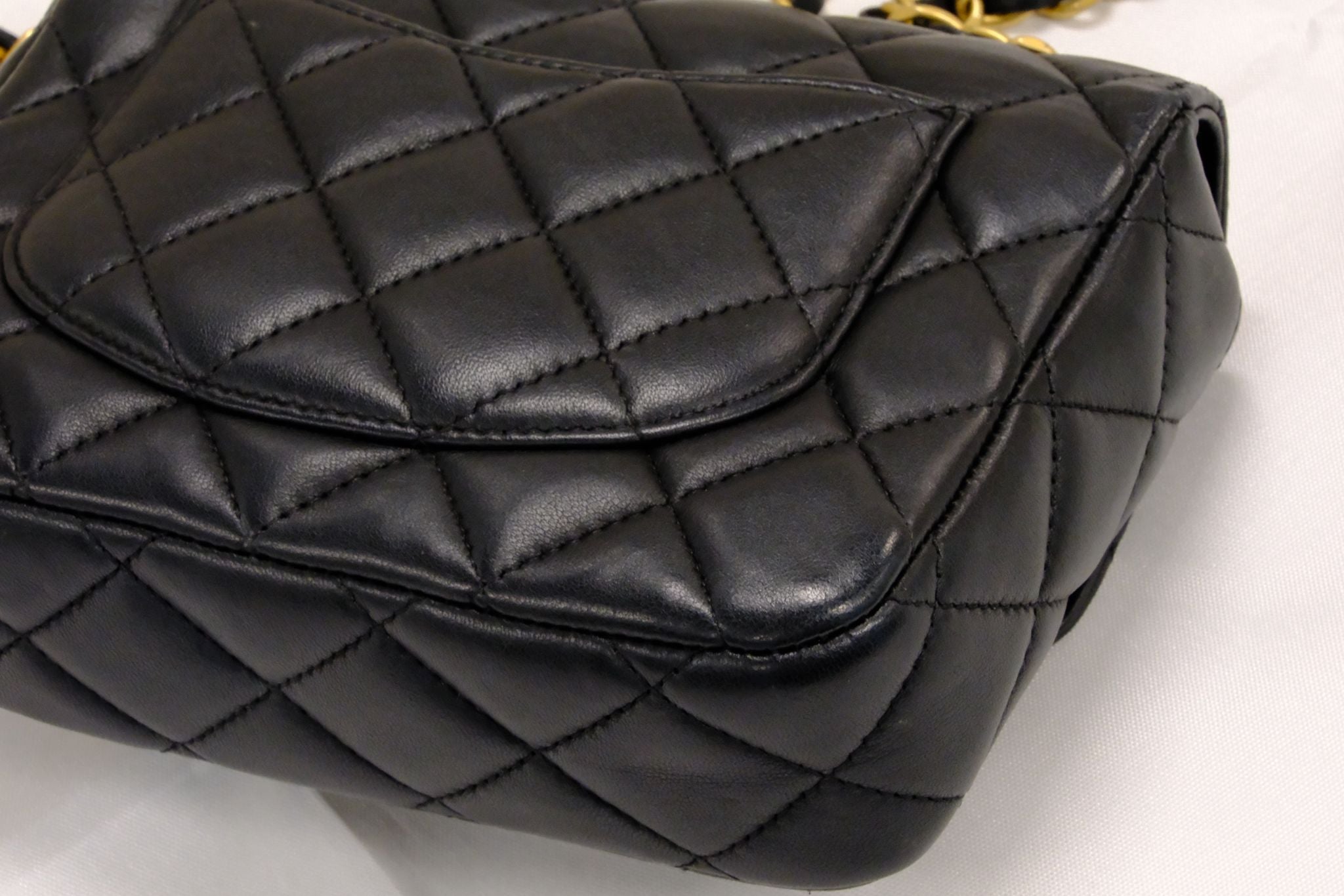 CHANEL 23C BLACK MINI SQUARE LAMSKIN CHARM COIN
