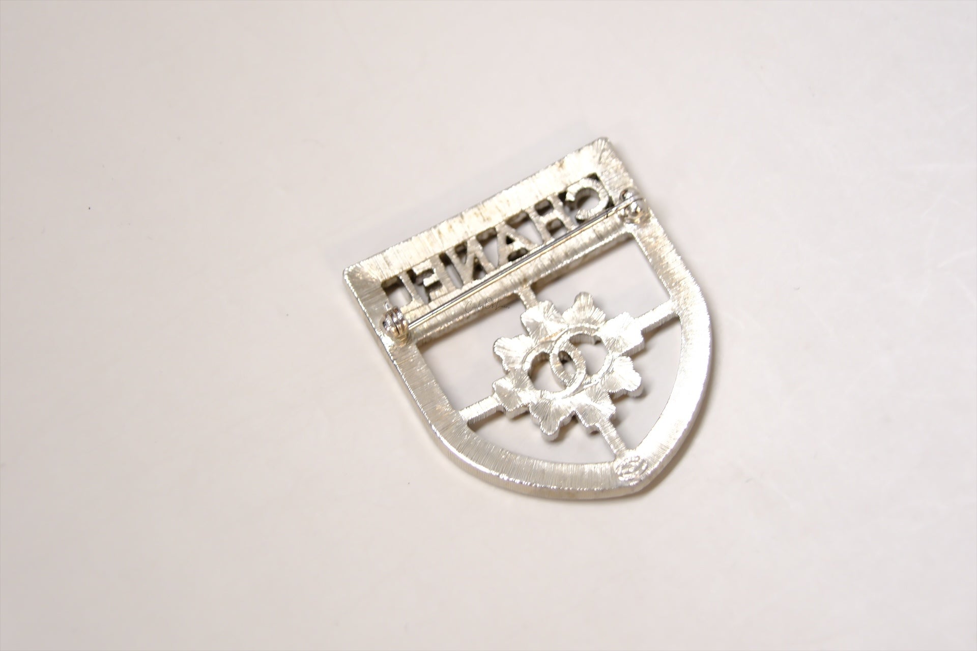 CHANEL SHIELD BROOCH WITH CRYSTALS SHW