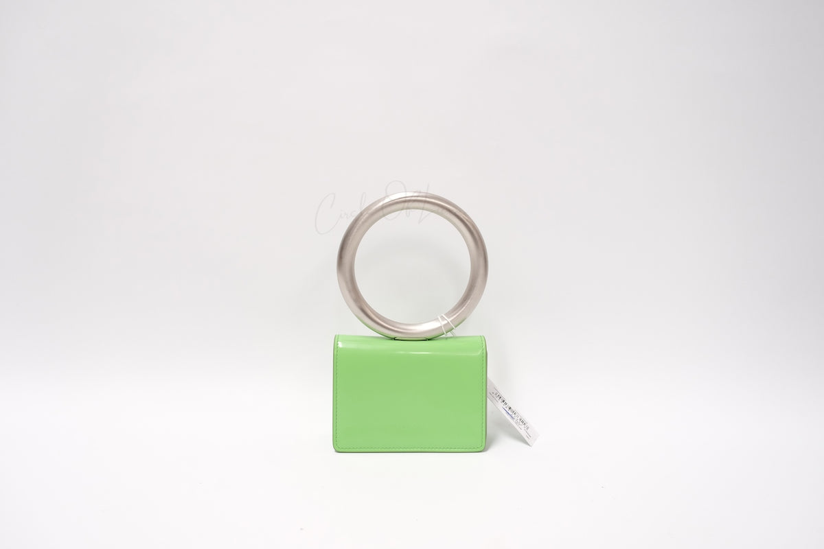 SALVATORE FERRAGAMO METAL HAND POUCH GREEN