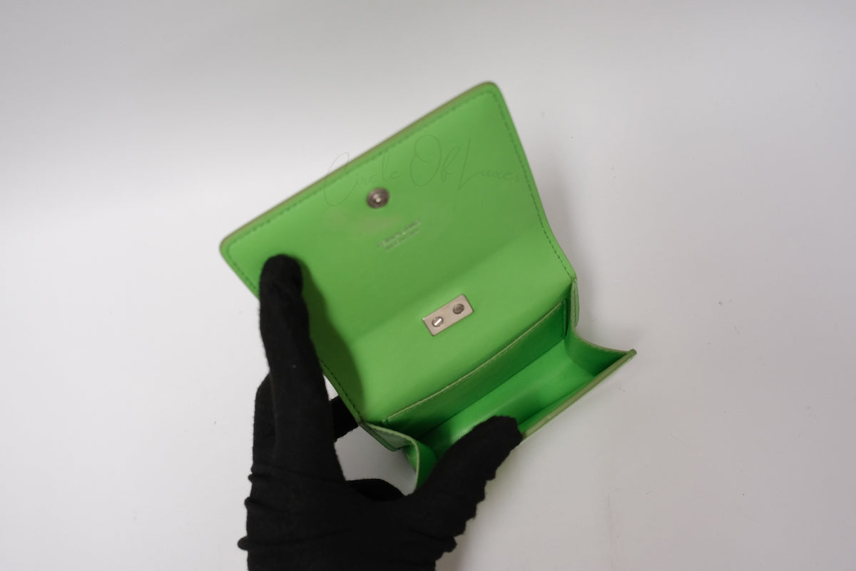 SALVATORE FERRAGAMO METAL HAND POUCH GREEN