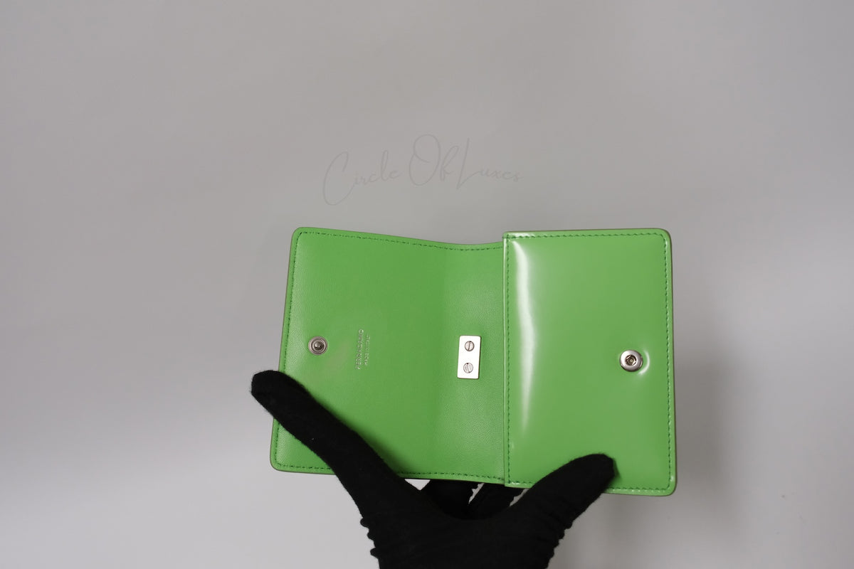 SALVATORE FERRAGAMO METAL HAND POUCH GREEN